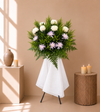 Ruby Condolences Flower Stand with white paper mums and lilac spider mums, front view