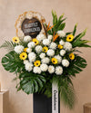 Tribute Condolences Flower Stand with yellow gerberas, white roses and spider mums, full arrangement