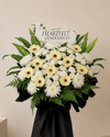 Claire Condolences Flower Stand with white spider mums and cream gerberas, full arrangement